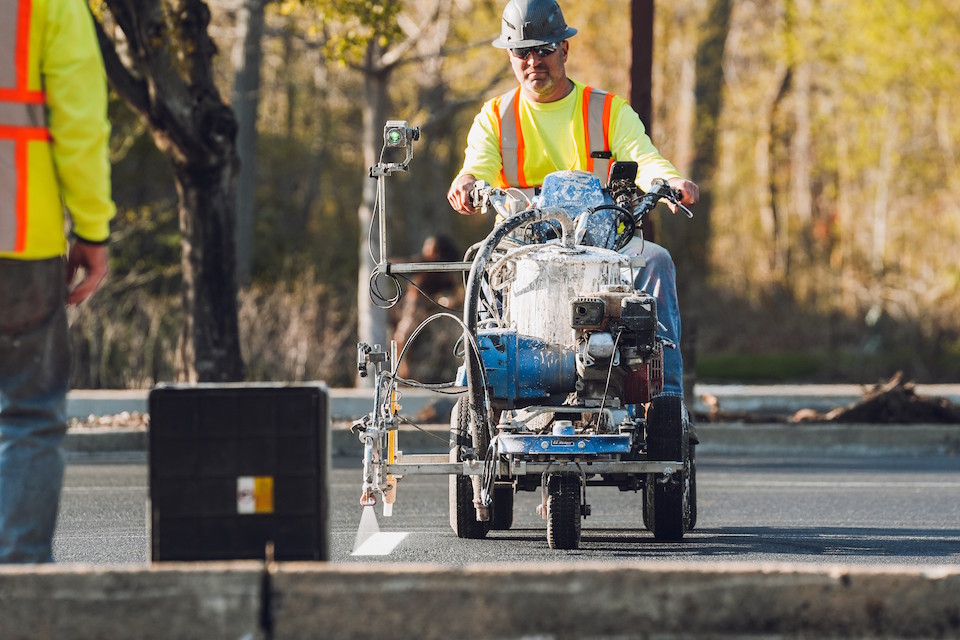 restripingnewres Delaware Valley Paving Worker doing Line Striping work